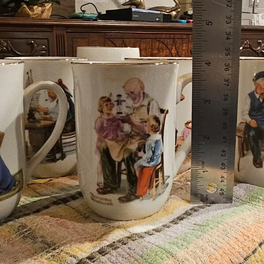 Collection of Norman Rockwell mugs
